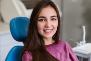 Beautiful,Girl,With,Braces,Smiles,In,Dentistry.